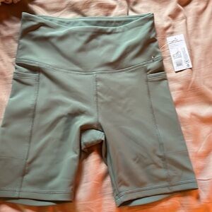 Green bike shorts size extra small new with tags
